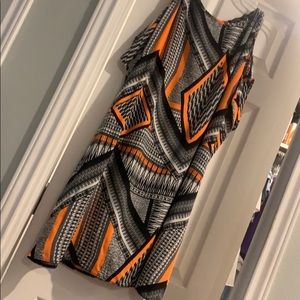 Mini dress with peek-a-boo shoulders